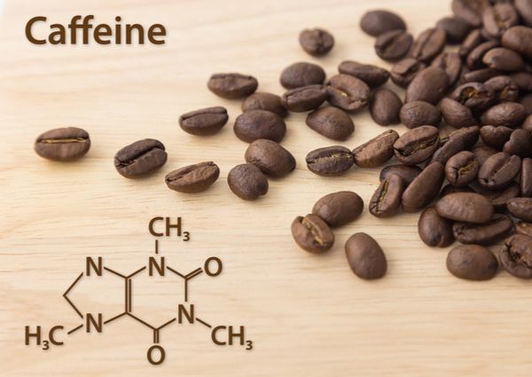 カフェインの分子構造とコーヒー豆の画像