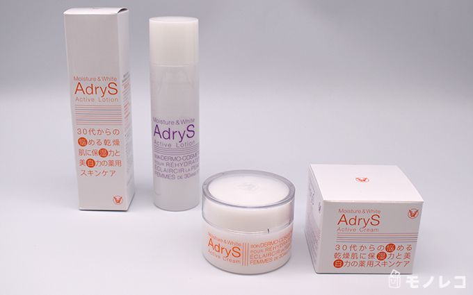 AdryS(アドライズ)のアクティブローションとアクティブクリームがパッケージと一緒に置かれている画像